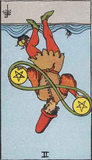 Two of Pentacles Reversed Meaning